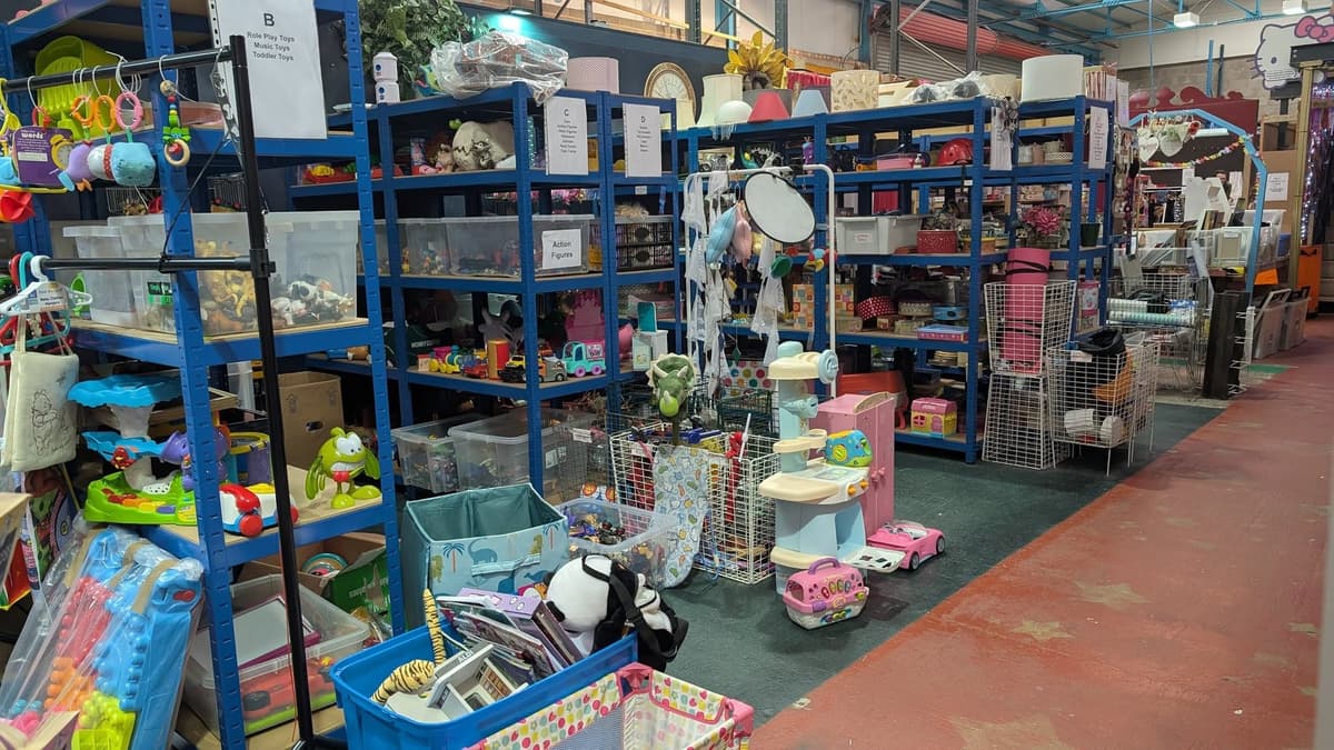 Aisles of donated goods at the Thrift Warehouse, Exeter